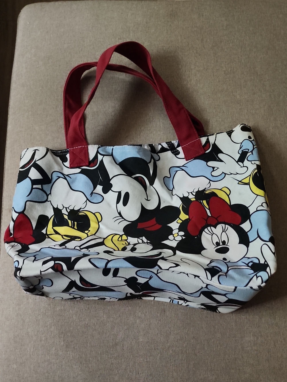 Red-Handled Cartoon Print Tote Bag Open Top. Inside Zio Conpartment.